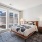 bedroom with bed and large windows