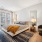 bedroom with bed and large windows