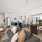 A spacious living area with an open kitchen layout