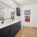 bathroom with large mirror and sinks